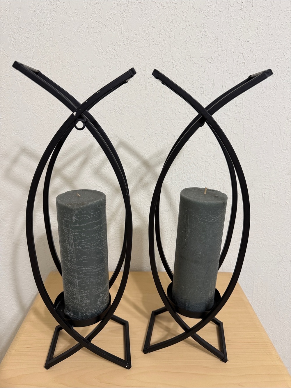 Pair of Black Metal Candle Holders with Gray Pillar Candles